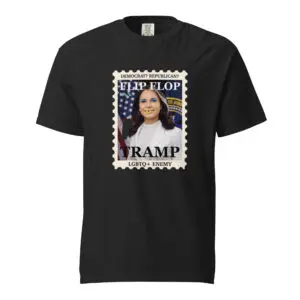 Black T-shirt featuring a vintage-style stamp design with a woman's photo and the words 'TRAMP'.