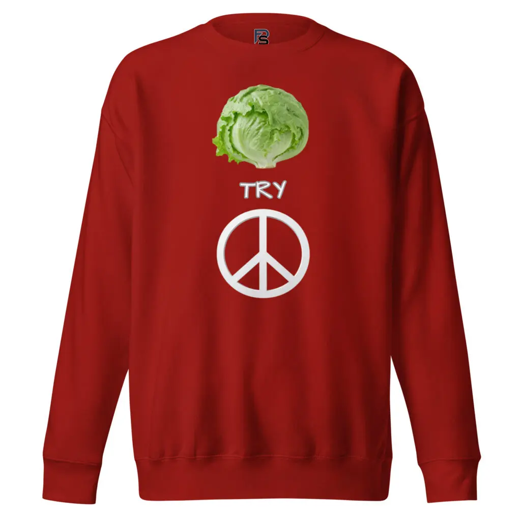 Red sweatshirt with lettuce, "TRY" and peace symbol.